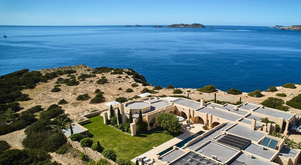 The clifftop view from Villa del Sol, one of the best luxury villas in Ibiza.